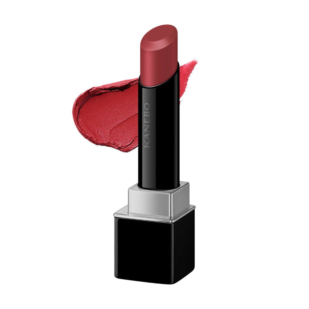 Kanebo Rouge Star Breath lipstick in a deep red shade with a rich, velvety texture, shown alongside a bold color swatch. Great for evening glam.