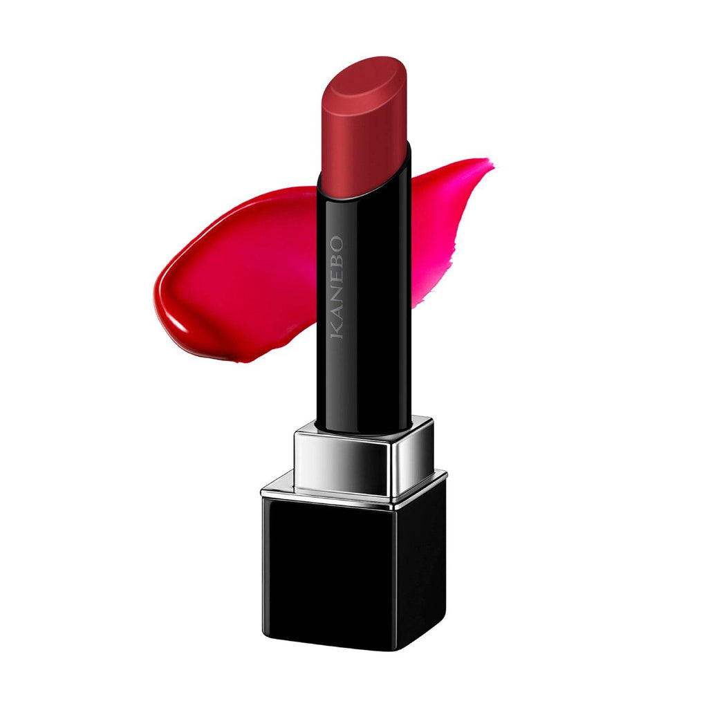 Kanebo Rouge Star Vibrant lipstick in a deep red shade with a creamy texture and glossy finish, displayed with a color swatch.