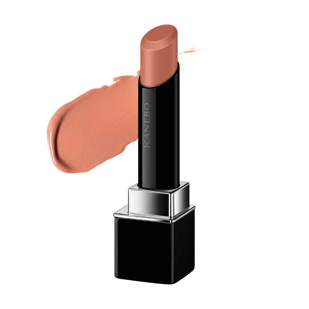 Kanebo Rouge Star Vibrant lipstick in a soft peach shade with a creamy texture and glossy finish, displayed with a color swatch.