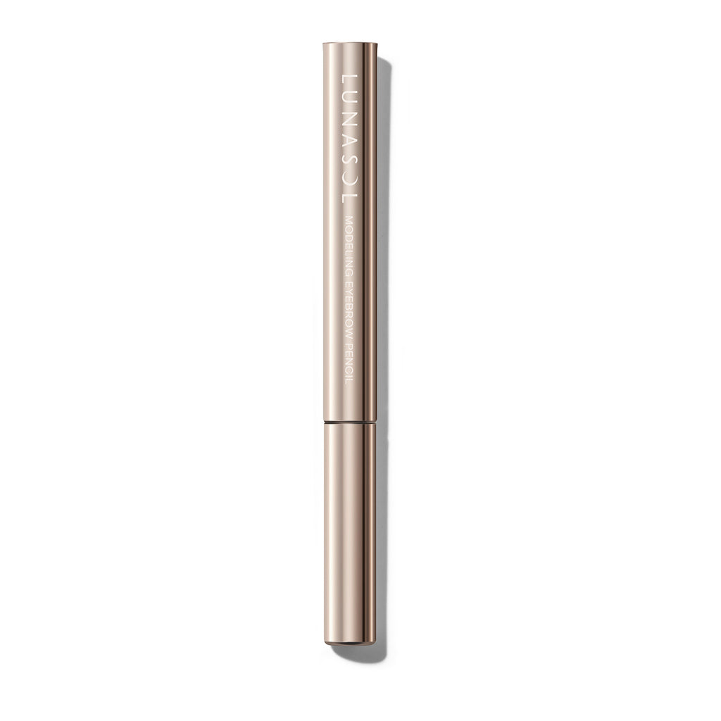 Lunasol Eyebrow Pencil in a sleek, gold-tone casing. Designed for precision and durability, offering a natural, smudge-proof finish for perfect brows.