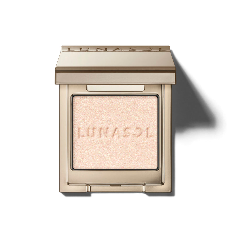 Lunasol Mono Eye Coloration eye shadow in a neutral beige shade, featuring a sleek gold compact design for versatile eye makeup.