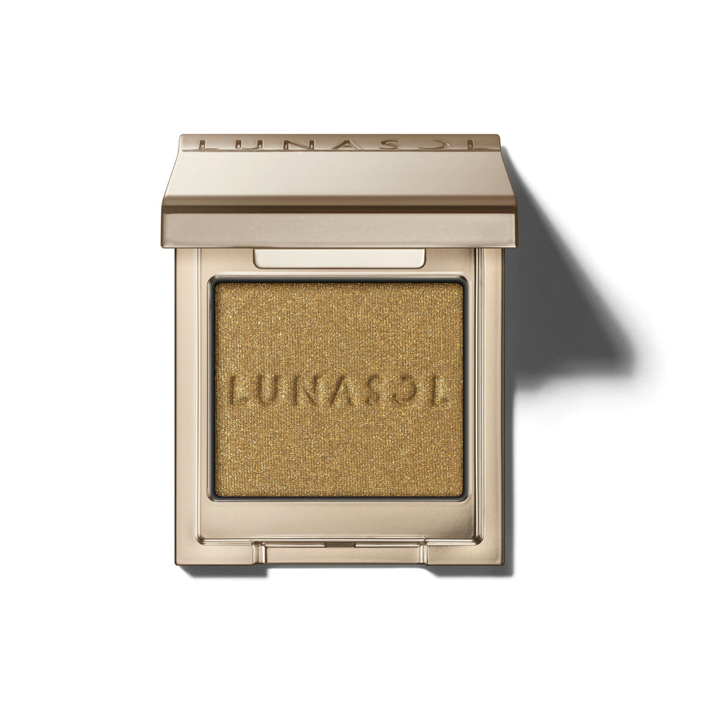 Lunasol Mono Eye Coloration eye shadow in a glittering gold shade, perfect for bold eye makeup, in a stylish gold compact.