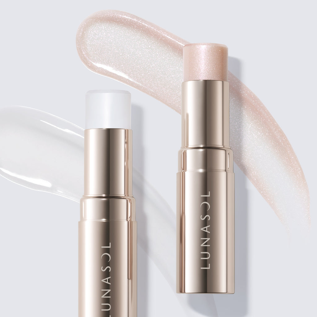 Lunasol Radiant Stick N highlighters in white and pink shades, with swatches showcasing their luminous, creamy textures.