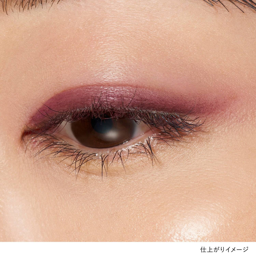 Close-up of an eye featuring Lunasol Smudge Nuance Liner in EX05 Deep Beets, creating a dramatic burgundy eye makeup look.