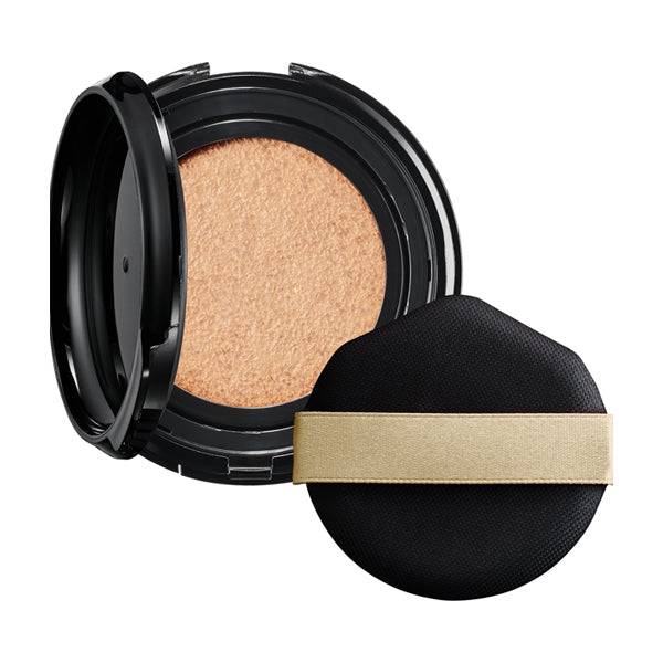 Maquillage Dramatic Essence Cushion Glow foundation in an open compact with a black and gold applicator puff. Provides a radiant, lightweight finish.