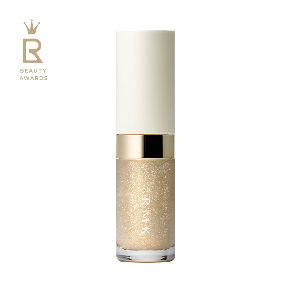 RMK Lip Luminizer 3.6g in sparkling yellow shade 04, with a white and gold cap and a clear tube showcasing the glittery gloss.