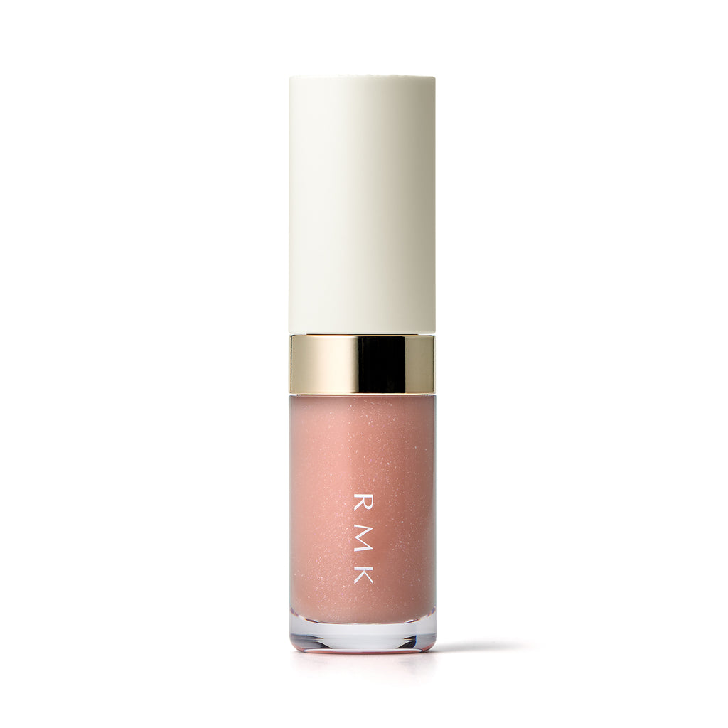 RMK Lip Luminizer 3.6g in pink beige shade EX-03, designed with a white and gold cap and a clear tube revealing the soft gloss.