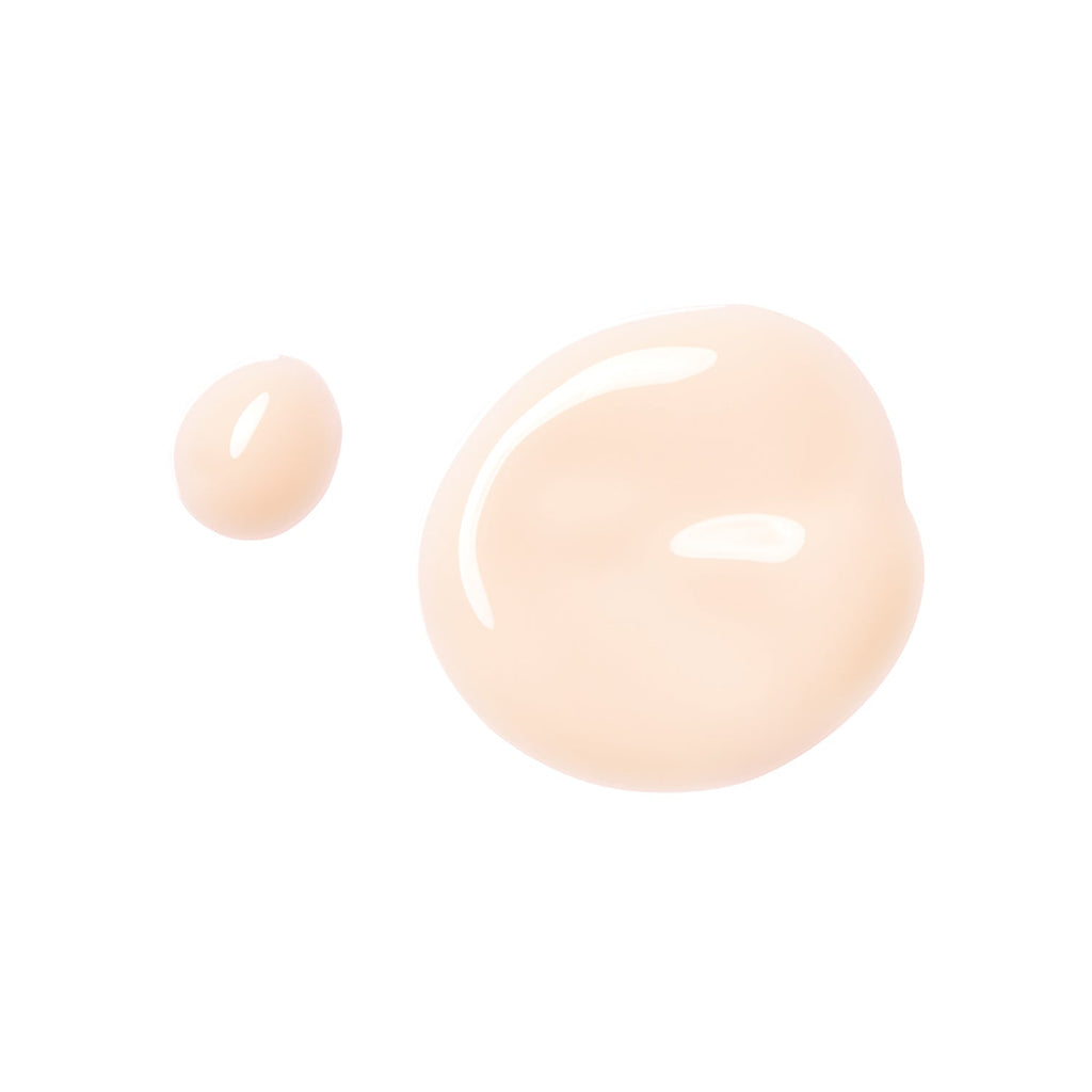 Close-up of RMK Makeup Base texture, showcasing its creamy, lightweight formula for a natural glow and smooth finish.