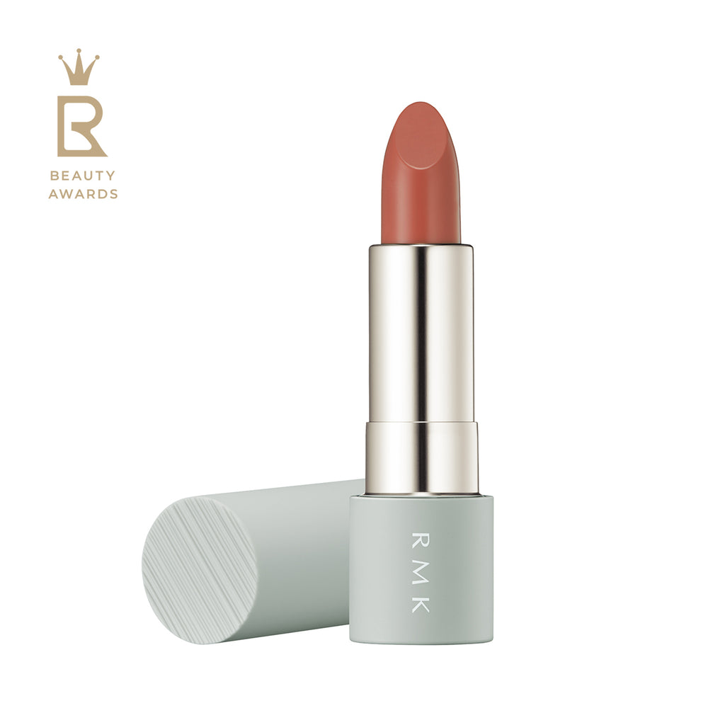 RMK The Matte Lip Color 4g in shade 02 Demure Pink, a timeless pink beige lipstick with a matte finish, in a stylish mint green case.