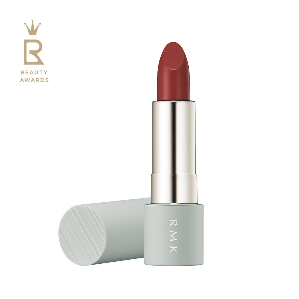 RMK The Matte Lip Color 4g in shade 10 Purple Majesty, a sophisticated burgundy lipstick with a matte finish, presented in a mint green tube.