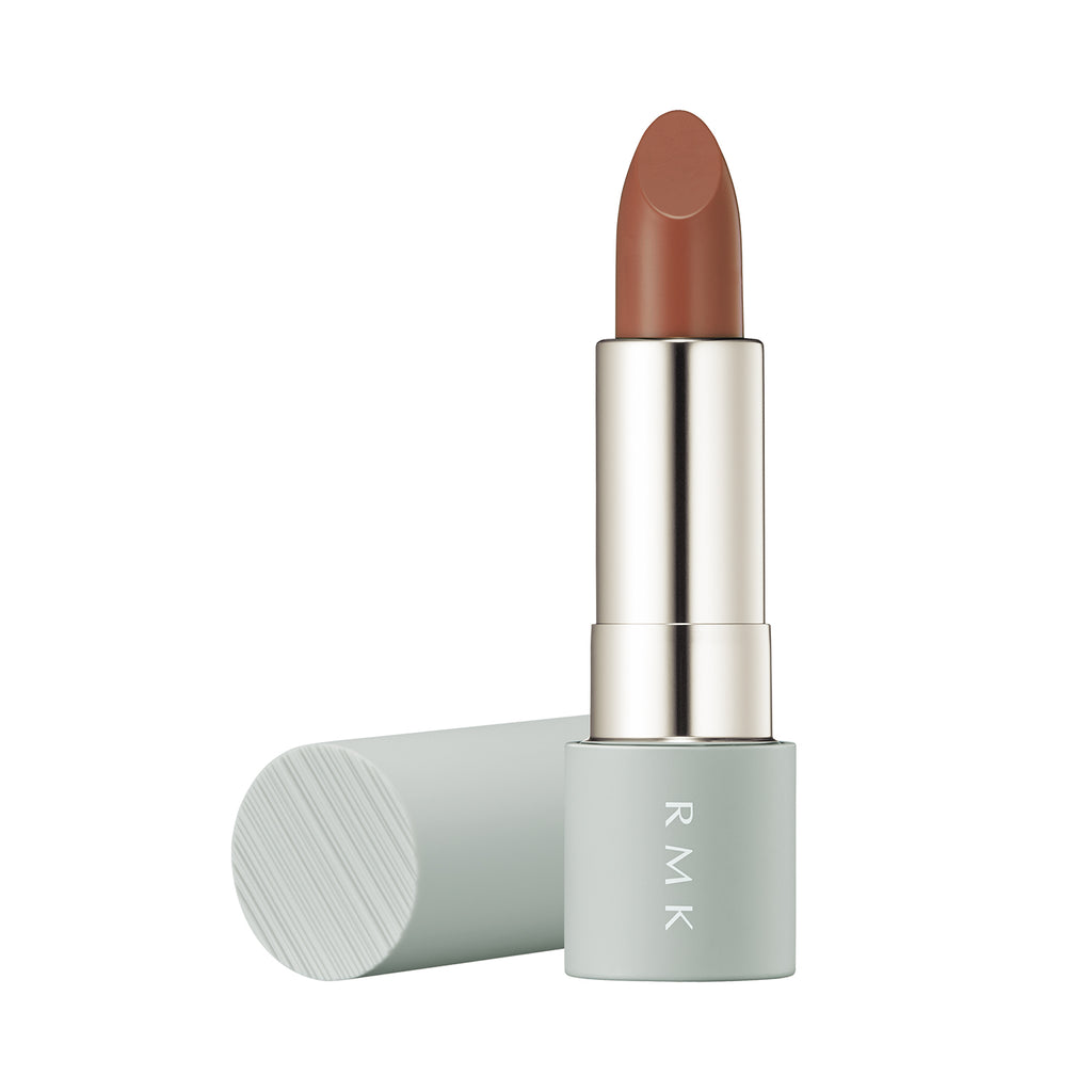 RMK The Matte Lip Color 4g in shade EX-07 Spice Wine, a chic grayish rosewood lipstick with a matte finish, in a mint green case.