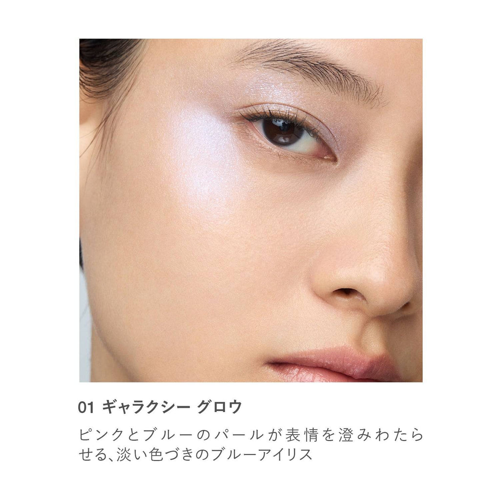 Close-up of RMK Radiant Color Stick 6.4g in shade 01 Galaxy Glow applied on skin, showcasing a subtle blue-toned shimmer.