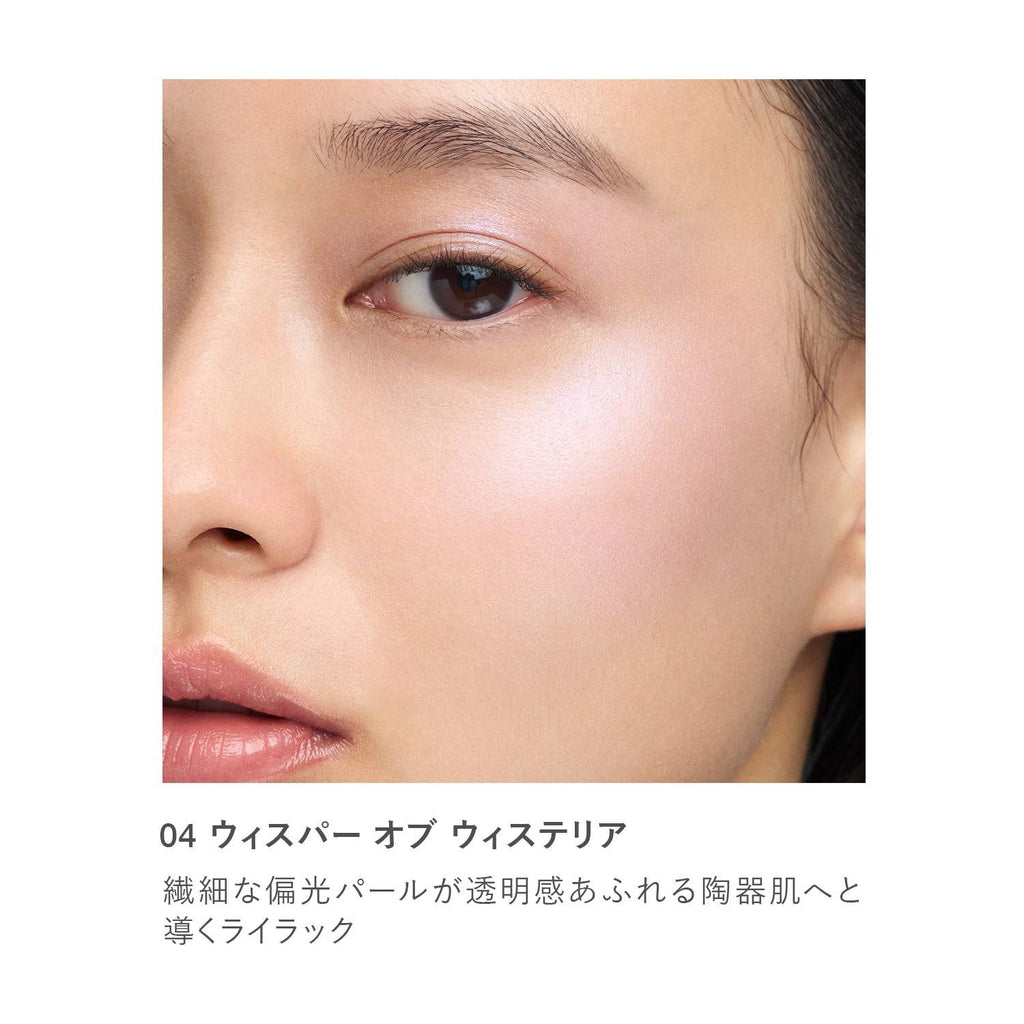 Close-up of RMK Radiant Color Stick 6.4g in shade 04 Whisper of Wisteria applied on skin, revealing a delicate lilac shimmer.