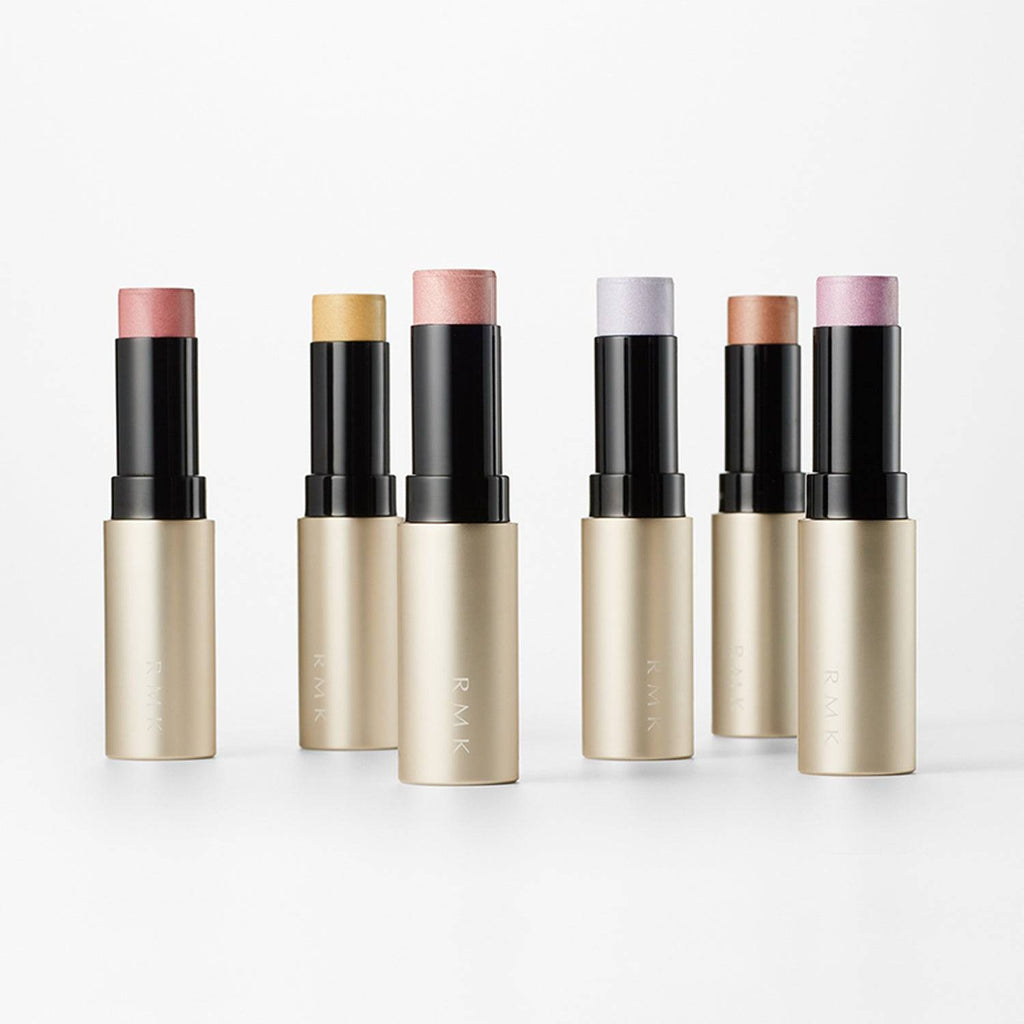 Set of RMK Radiant Color Stick 6.4g in six shades with sleek gold packaging, ideal for blushes and bronzers in Tokyo Beauty Box.