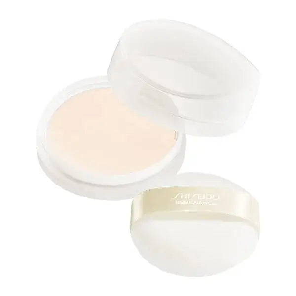 Shiseido Benefiance Brightening Skin Care Powder in an open container with a soft applicator puff. Achieve a silky, radiant finish while preventing spots.