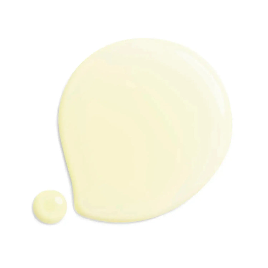 Close-up of Shiseido Future Solution LX Legendary EN Luminance Serum's creamy, light yellow texture for radiant skin.