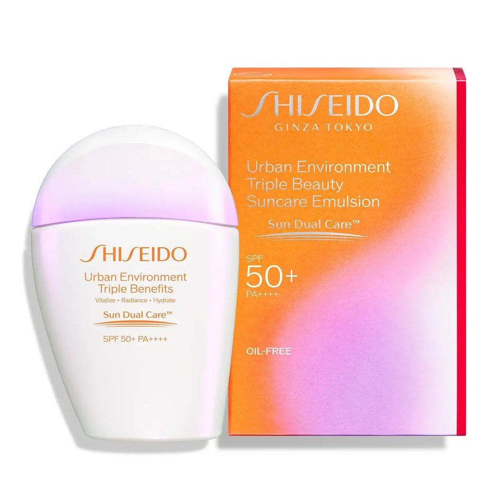 Shiseido Urban Triple Beauty Suncare Emulsion 30ml with SPF 50+ PA++++ alongside its vibrant orange and pink packaging box.
