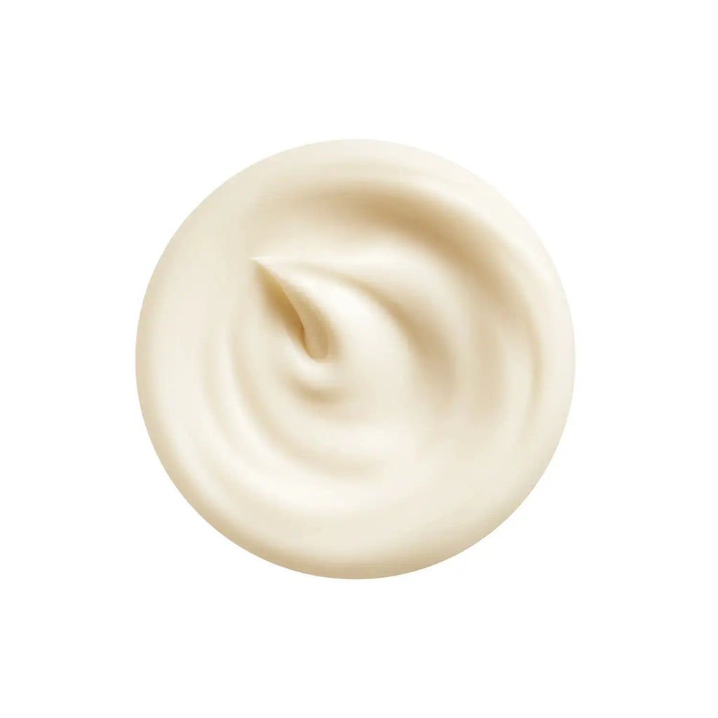 Close-up of the creamy texture of Shiseido Vital Perfection Radiance Serum, showcasing its smooth and luxurious formula.