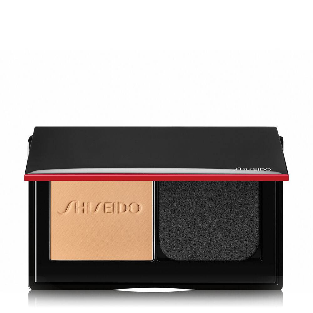 Shiseido Synchro Skin Self-Refreshing Custom Finish Powder Foundation in a black compact with a red accent and sponge applicator.