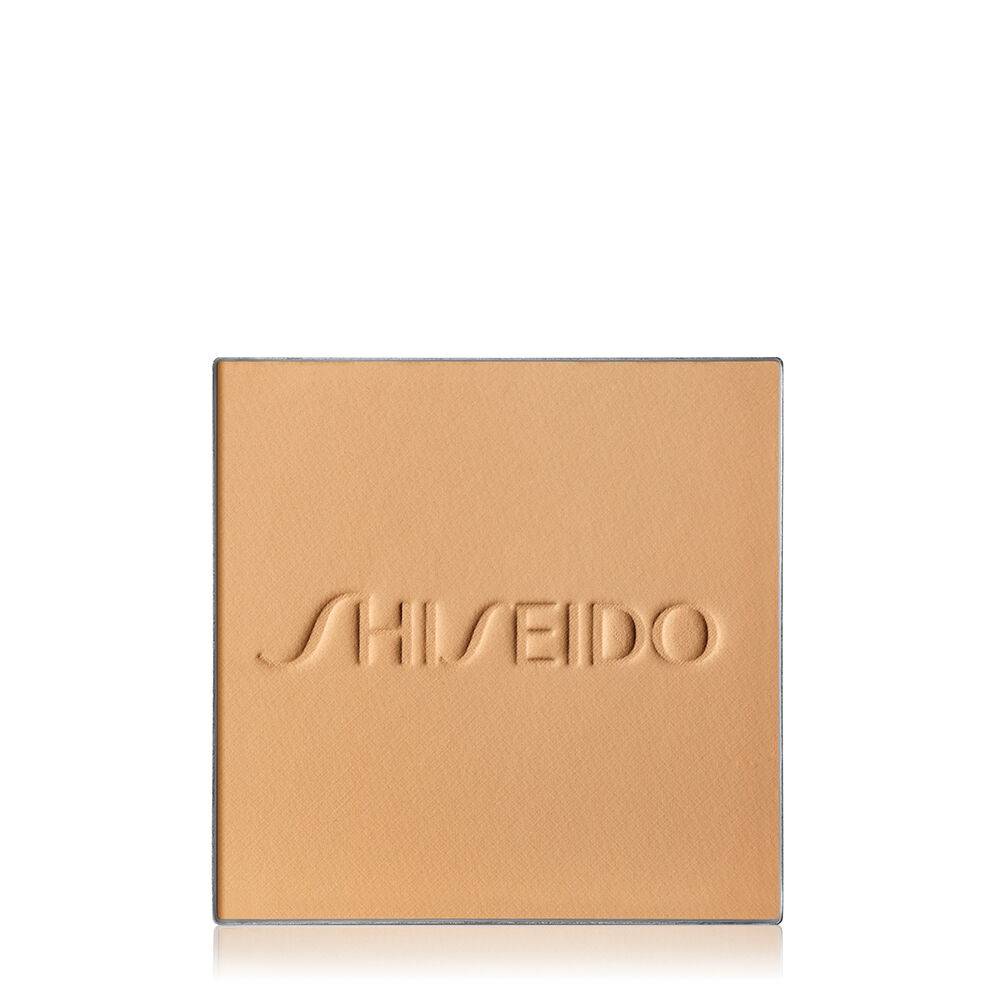 Shiseido Synchro Skin Self-Refreshing Powder Foundation refill in a warm beige shade, embossed with the Shiseido logo.