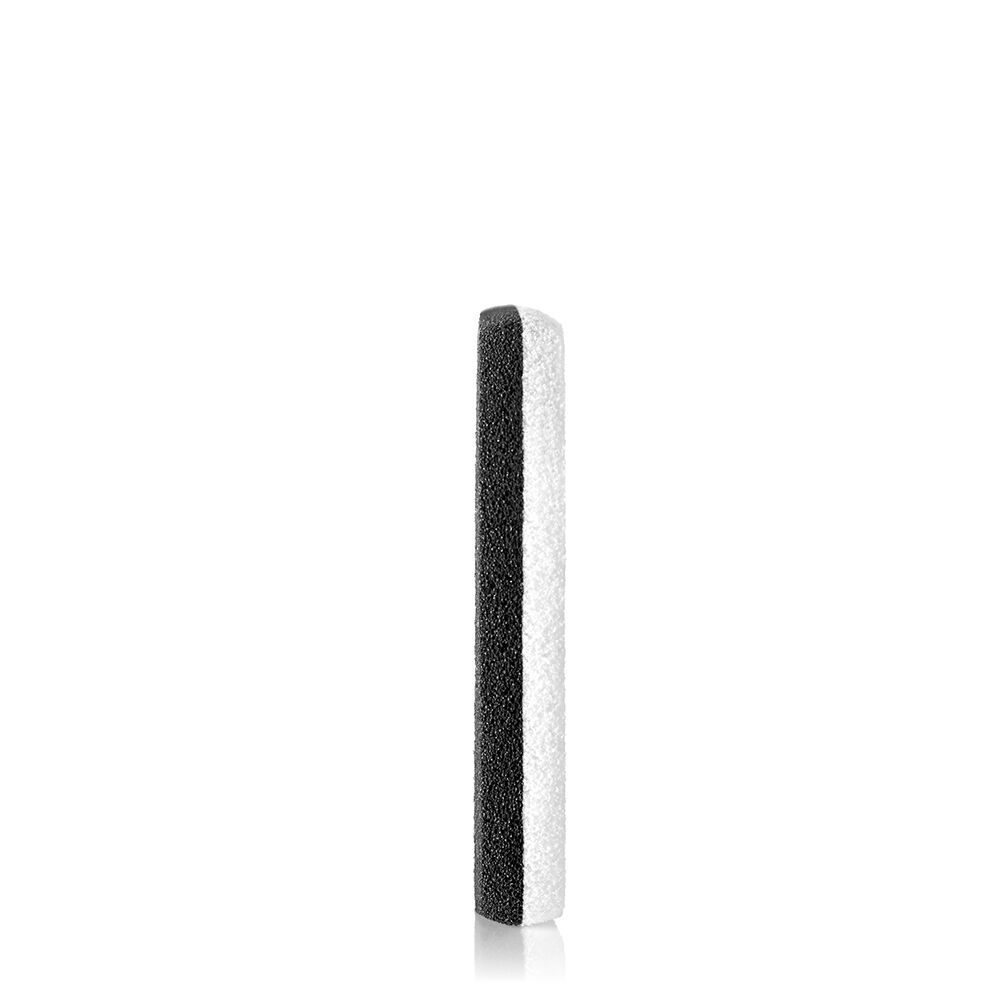 Side view of the black sponge applicator for Shiseido Synchro Skin Powder Foundation, showing its thickness and texture.