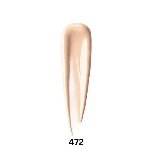 Swatch of Shu Uemura Unlimited Care Tsuya Serum Foundation in shade 472, showcasing its creamy texture and light beige tone.