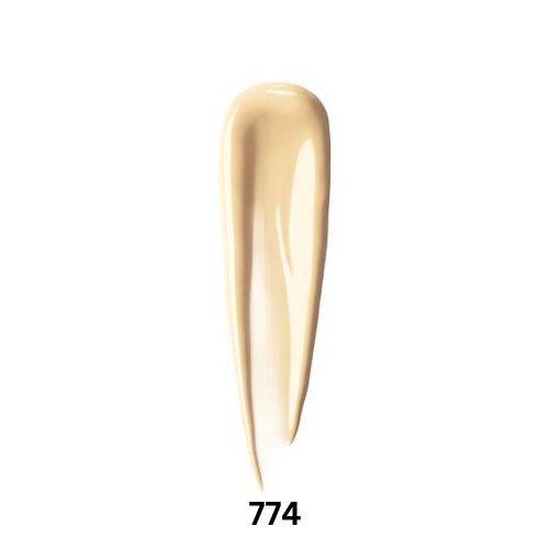Shu Uemura Unlimited Care Tsuya Serum Foundation swatch in shade 774, a neutral beige tone with a creamy texture.