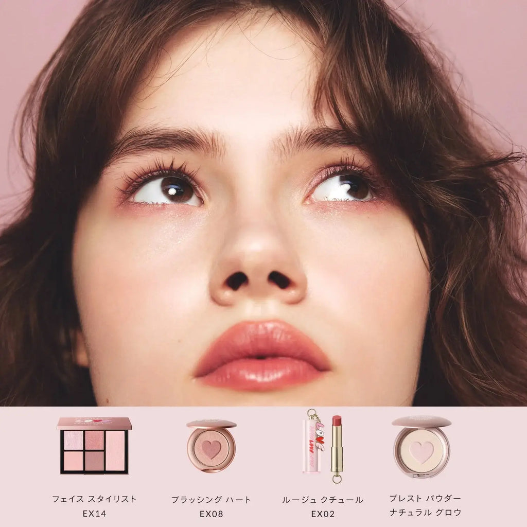 Model wearing Snidel Beauty Rouge Couture EX02 Honey Red with complementary makeup. A perfect Valentine's look with soft, radiant lip color.
