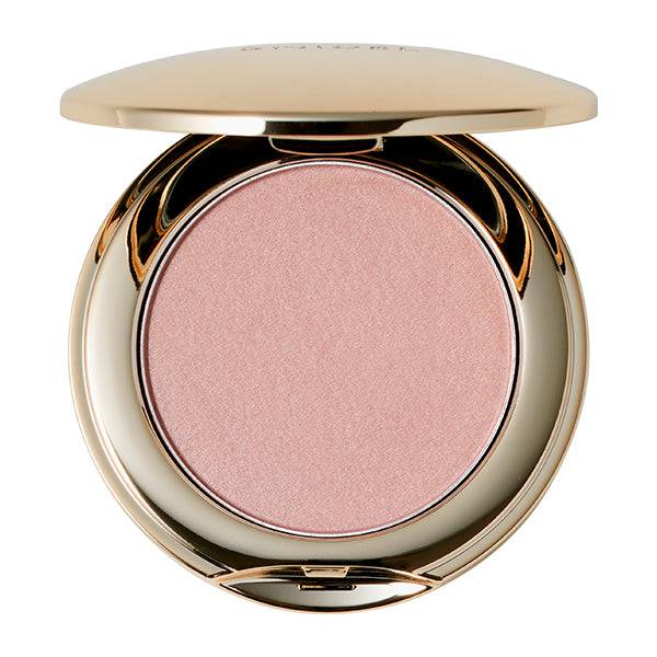 Snidel Beauty Skin Glow Blush in a soft peachy-pink shade, encased in a sleek gold compact for a luminous finish.