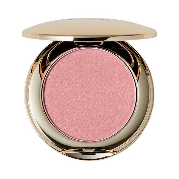 Snidel Beauty Skin Glow Blush in a rosy pink shade, offering a radiant and youthful finish in a gold compact.