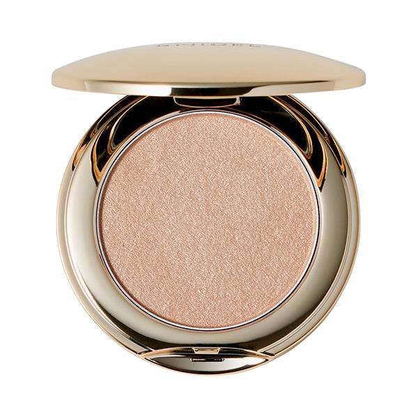 Snidel Beauty Skin Glow Blush in a golden beige shade, ideal for a subtle, sun-kissed radiance. Housed in a gold compact.