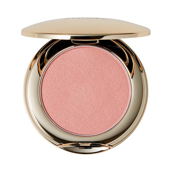 Snidel Beauty Skin Glow Blush in a warm peach shade, offering a natural and luminous finish in a gold compact.