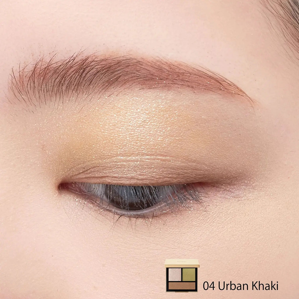 Close-up of an eye wearing Snidel Beauty Tailored Color Eyes 04 Urban Khaki, highlighting a natural green and brown eye makeup look with a soft shimmer.