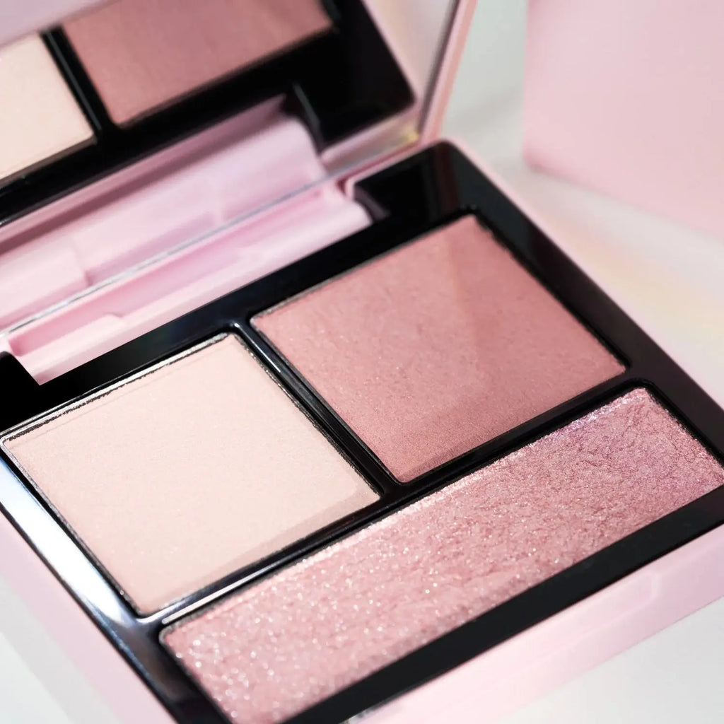 Detailed view of Snidel Beauty EX09 Stay Charming palette with soft pink, mauve, and shimmering shades.