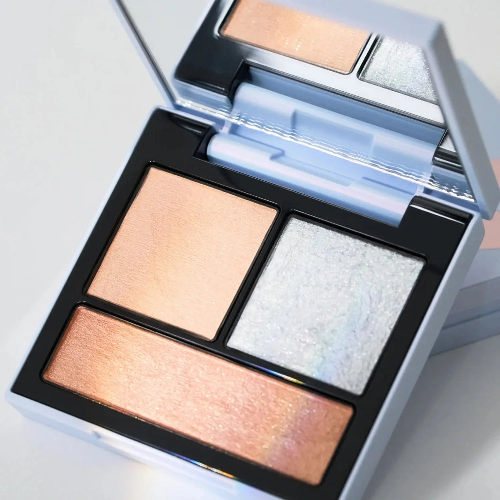 Detailed view of Snidel Beauty EX08 Stay Lucky palette with shimmering gold, silver, and bronze shades.