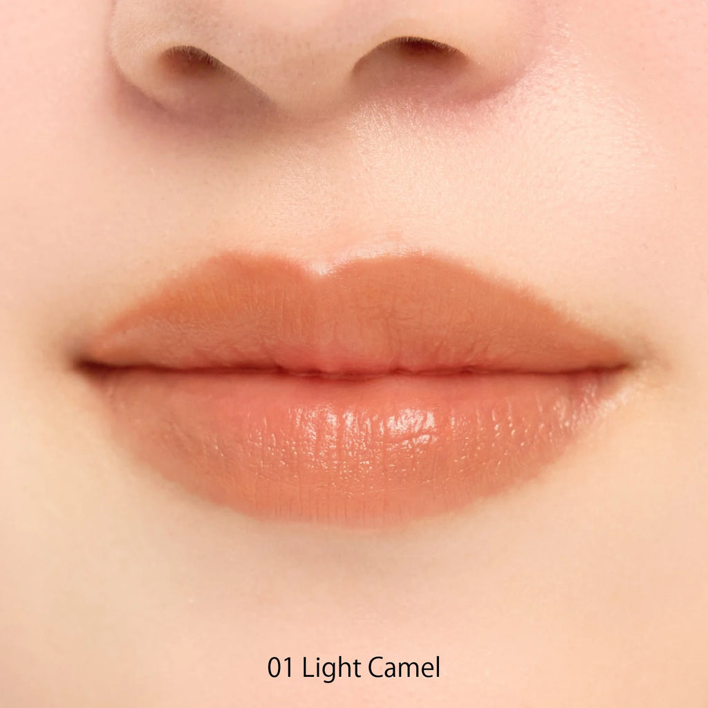 Snidel Pure Lip Shaper luxury lipstick tube on white background showcasing elegant lip product packaging