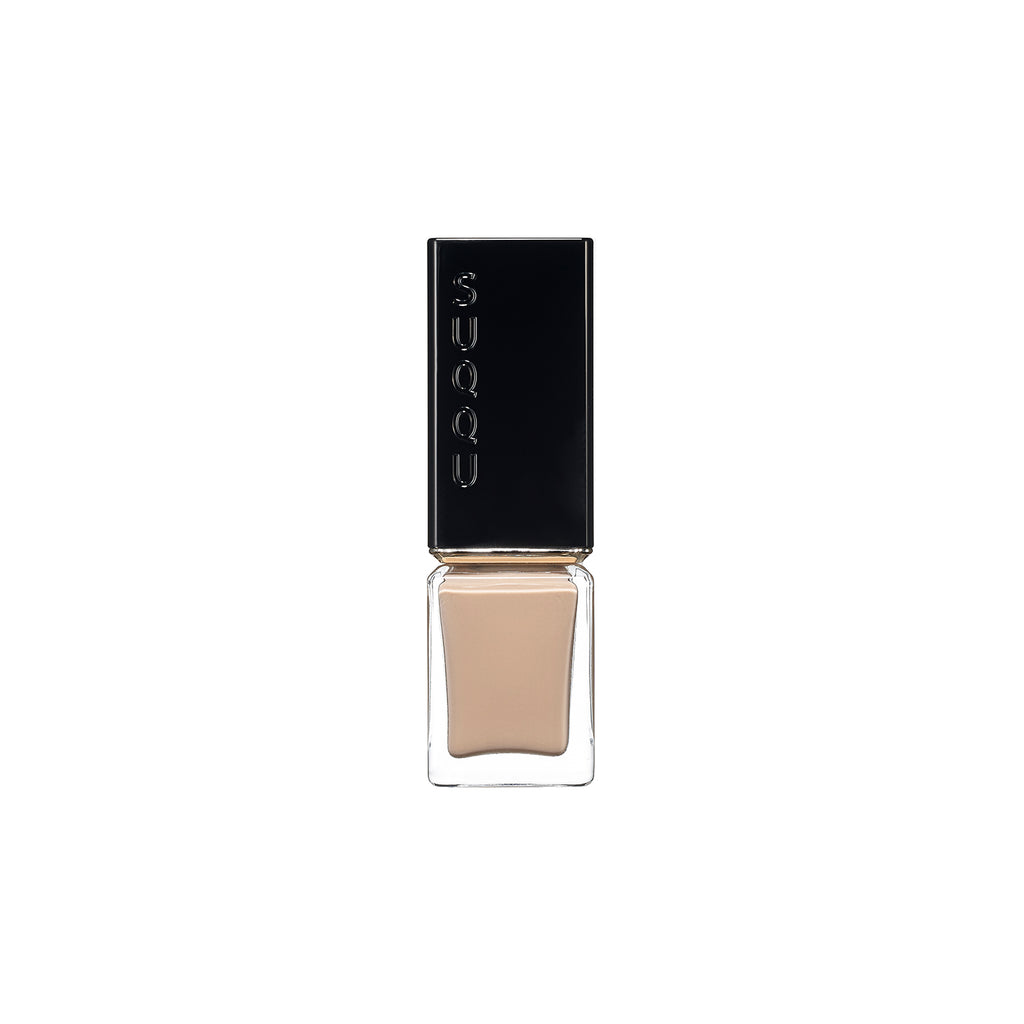 Suqqu Nail Color Polish in a sandy beige color, part of the Tokyo Beauty Box collection for subtle elegance.