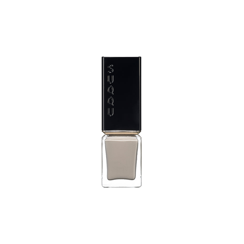 Suqqu Nail Color Polish in a cool gray tone, perfect for a modern and understated nail look.