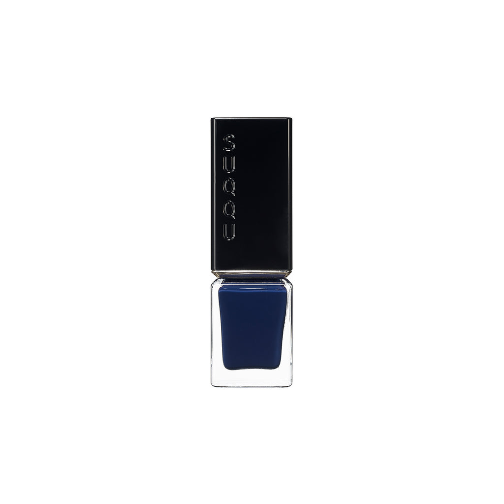 Suqqu Nail Color Polish in a deep navy blue hue, ideal for bold and sophisticated nail styling.