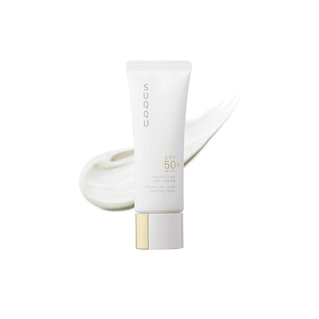 Suqqu Protecting Day Cream SPF 50+ with a smooth texture, offering intense moisture and UV protection while leaving a radiant, glossy veil on the skin.