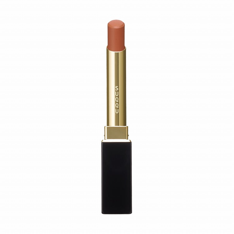 Suqqu Velvet Fit Lipstick in a warm orange-brown shade, housed in a stylish black and gold tube for a flawless lip finish.