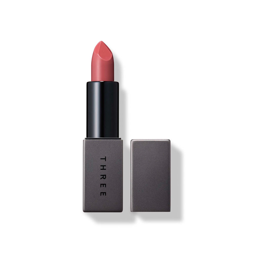 Three Dream On Alluring Lip Stick in shade 02 Dream of You, a soft pink hue with elegant gray packaging. Perfect for everyday wear.