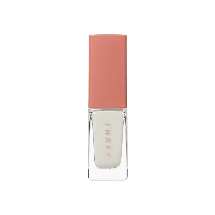 Three Nail Lacquer 7ml in soft white shade with a peach-toned cap, ideal for clean and minimal nail looks. Part of Tokyo Beauty Box collection.