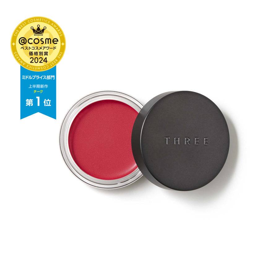 Three Glam Tone Color Custard in vibrant red shade, a versatile makeup balm for eyes, cheeks, lips, and eyebrows with a waterproof formula.