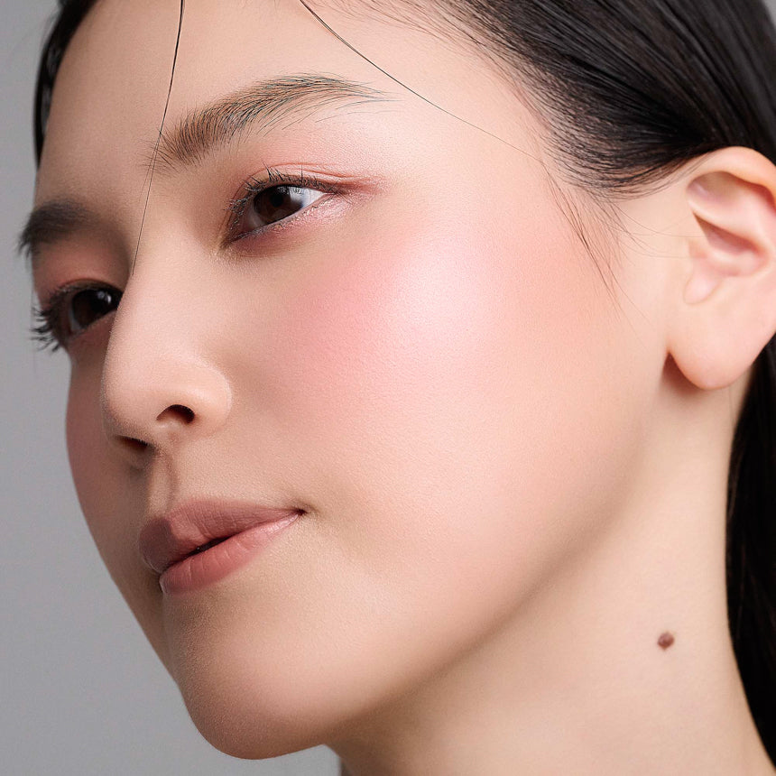 Shimmering glow THREE highlighter blush and contour palette for radiant, natural makeup look