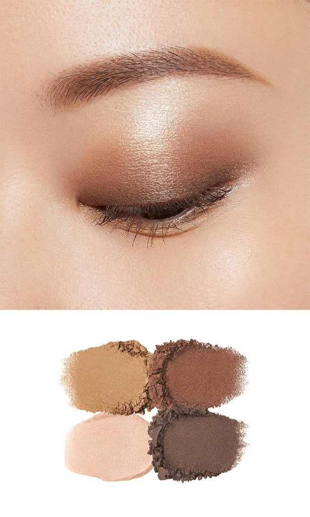 Clé de Peau Beauté Ombre Couleur Quadri eye shadow swatches applied on the eyelid, featuring warm gold and brown tones with a soft shimmer.