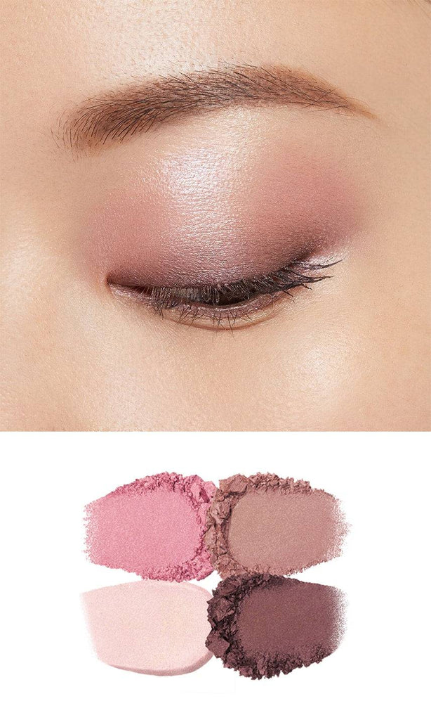 Clé de Peau Beauté Ombre Couleur Quadri eye shadow swatches applied on the eyelid, showcasing green and gold tones with a luminous finish.