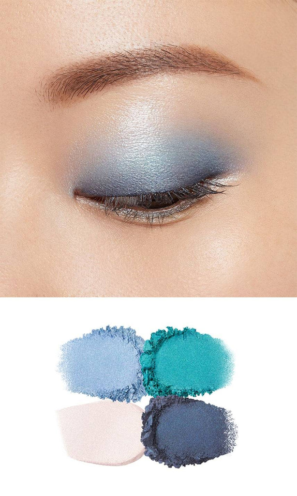Clé de Peau Beauté Ombre Couleur Quadri eye shadow swatches applied on the eyelid, showcasing purple and mauve tones with a luminous finish.