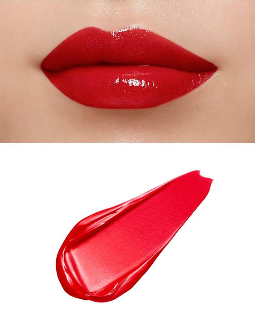Close-up of lips wearing Clé de Peau Beauté Rouge Crème Briand in red, showcasing high-shine finish and rich color with a red swatch.