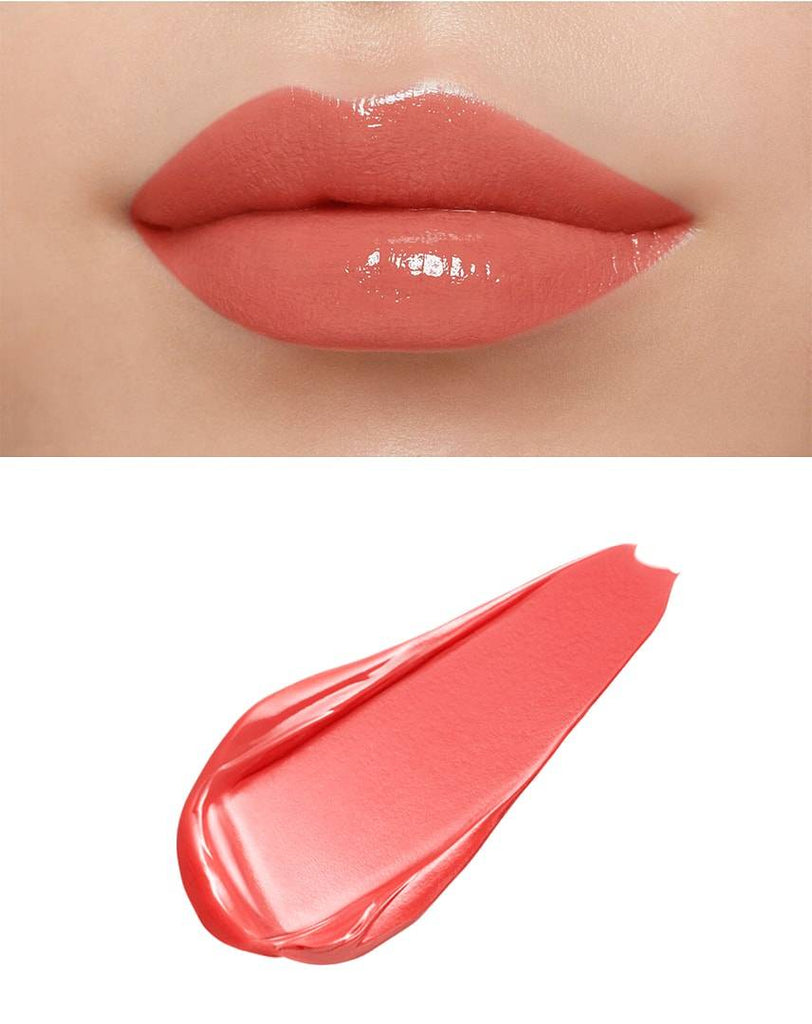 Glossy lips wearing Clé de Peau Beauté Rouge Crème Briand in coral pink, paired with a matching swatch showcasing its creamy texture.